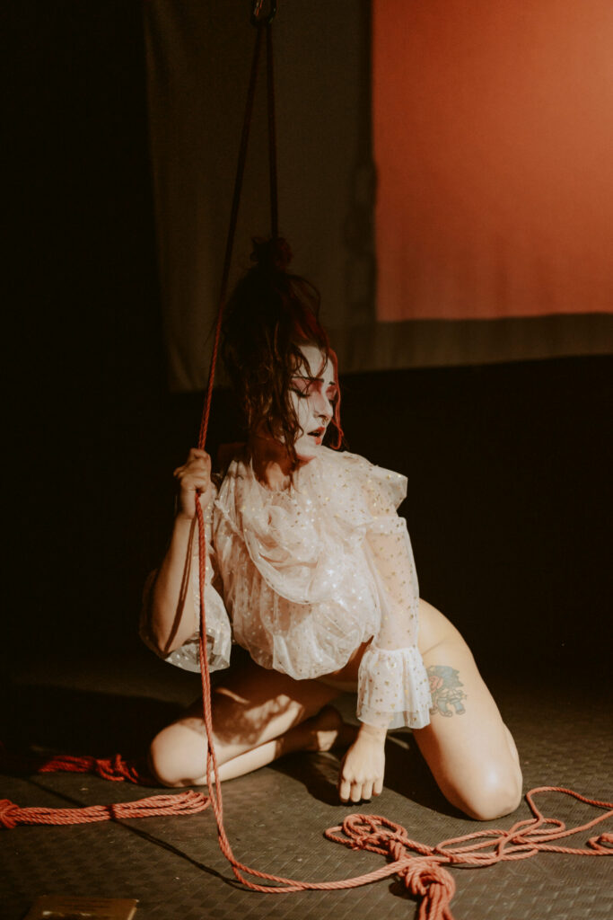 Photos during a shibari performance