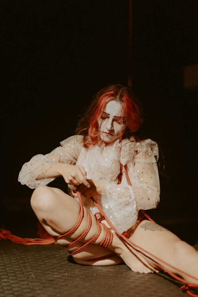 Photos during a shibari performance