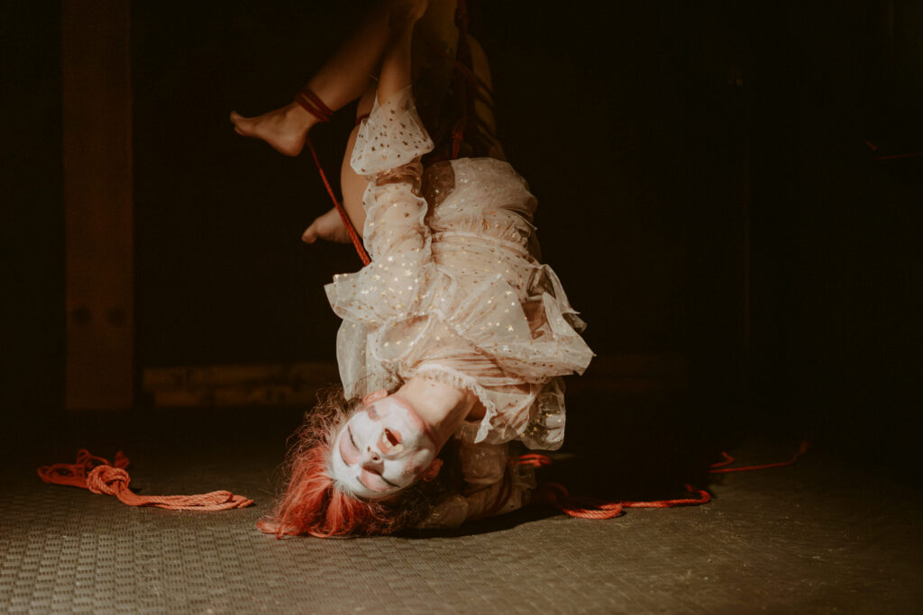 Photos during a shibari performance