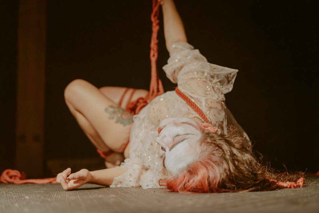 Photos during a shibari performance