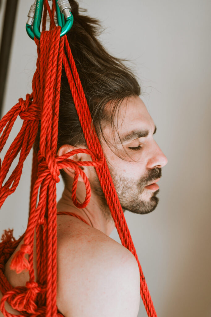 Intimate shibari session with male model
