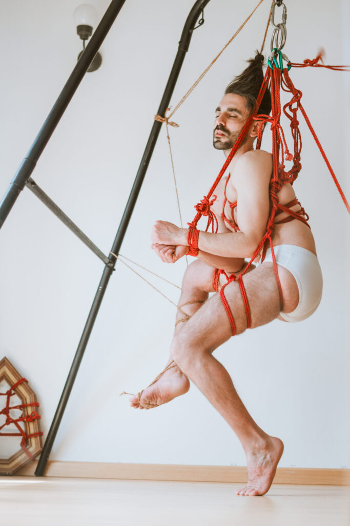 Intimate shibari session with male model