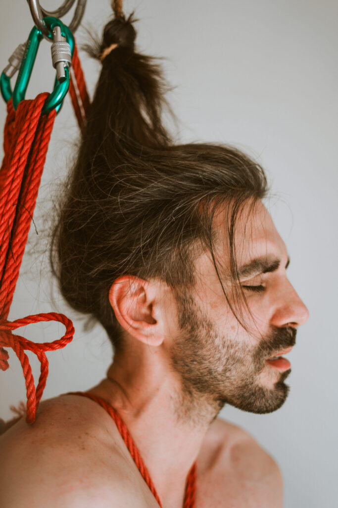 Intimate shibari session with male model