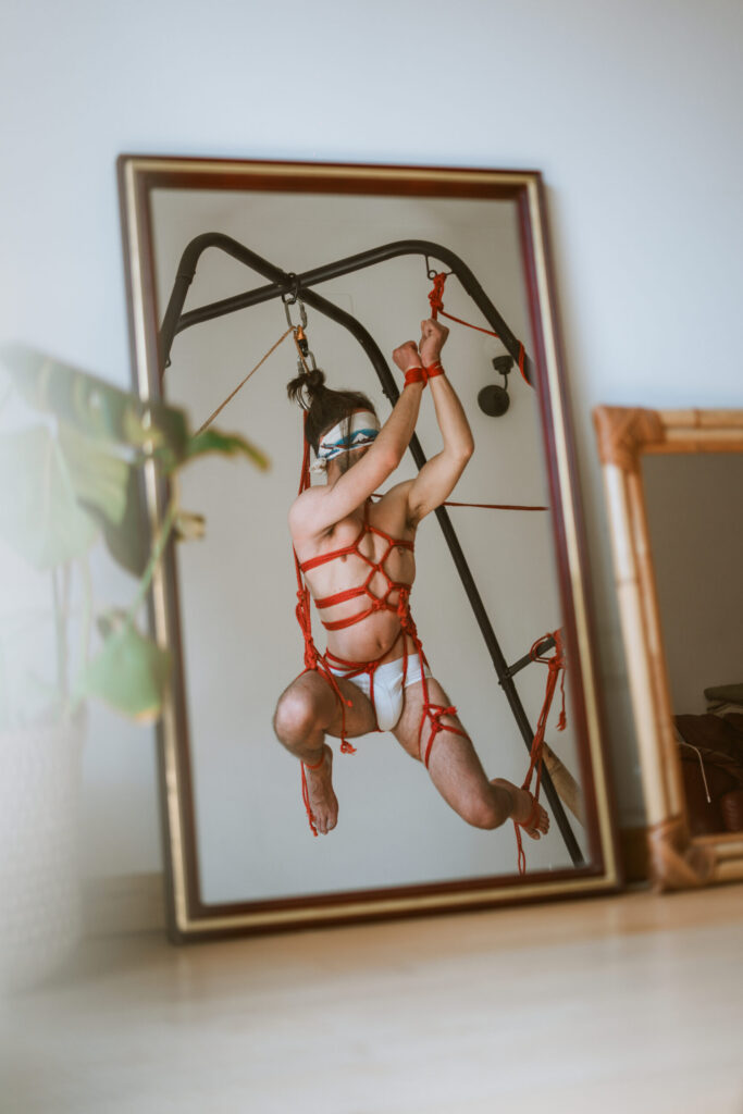 Intimate shibari session with male model