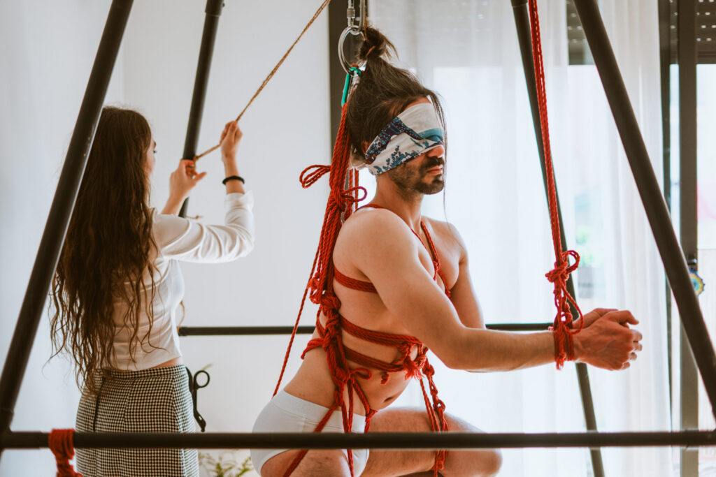 Intimate shibari session with male model