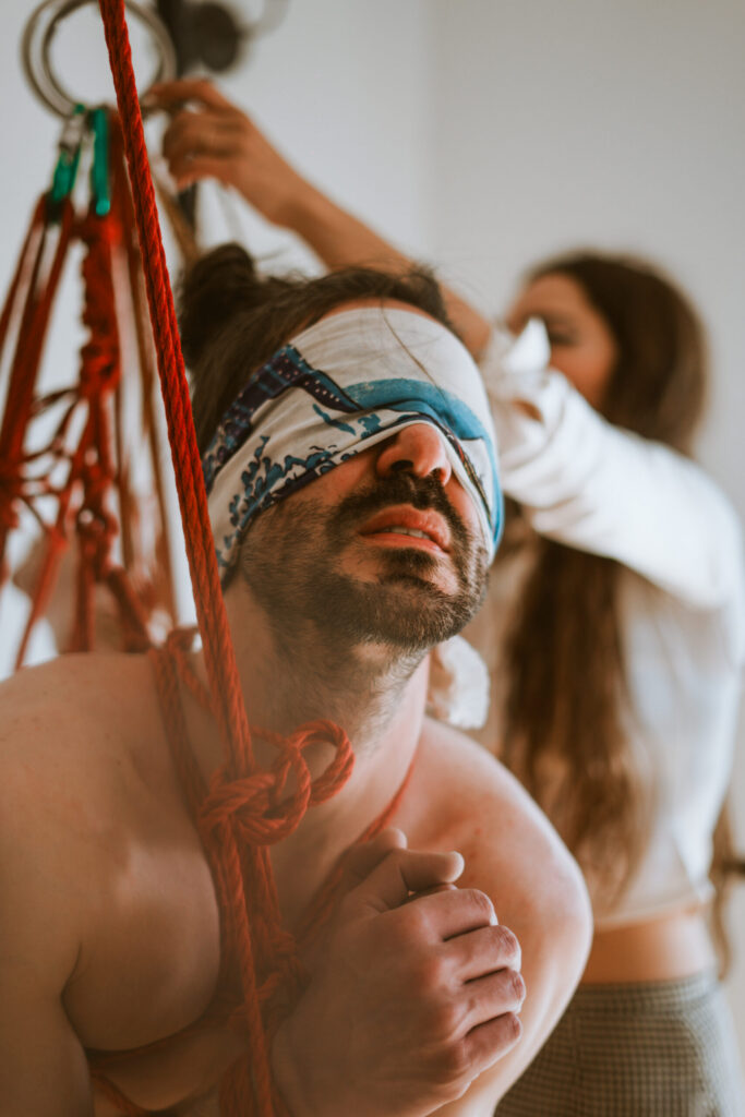 Intimate shibari session with male model