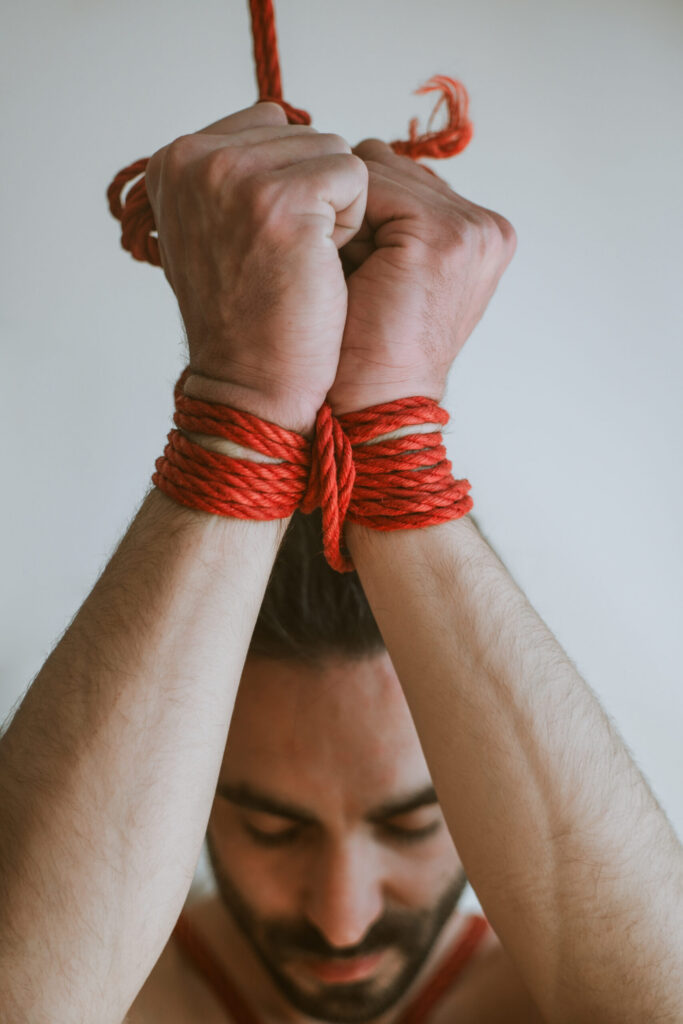 Intimate shibari session with male model