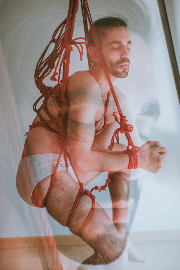 Intimate shibari session with male model